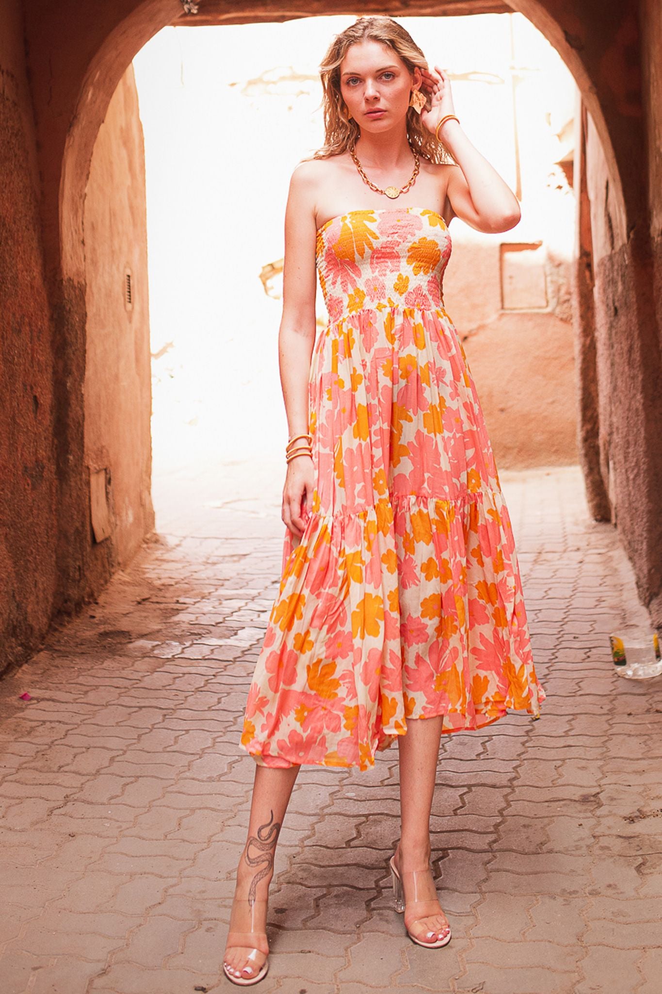 Sleeveless ruched bodice midi dress with ecru and peach and tangerine all over floral print