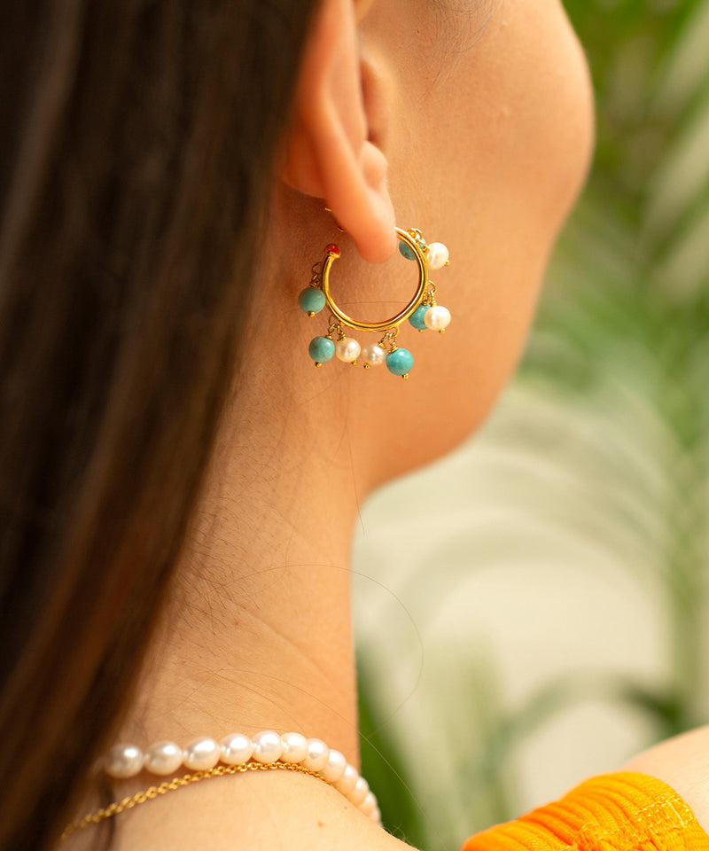 Hoop earrings with pearl and turquoise bead details