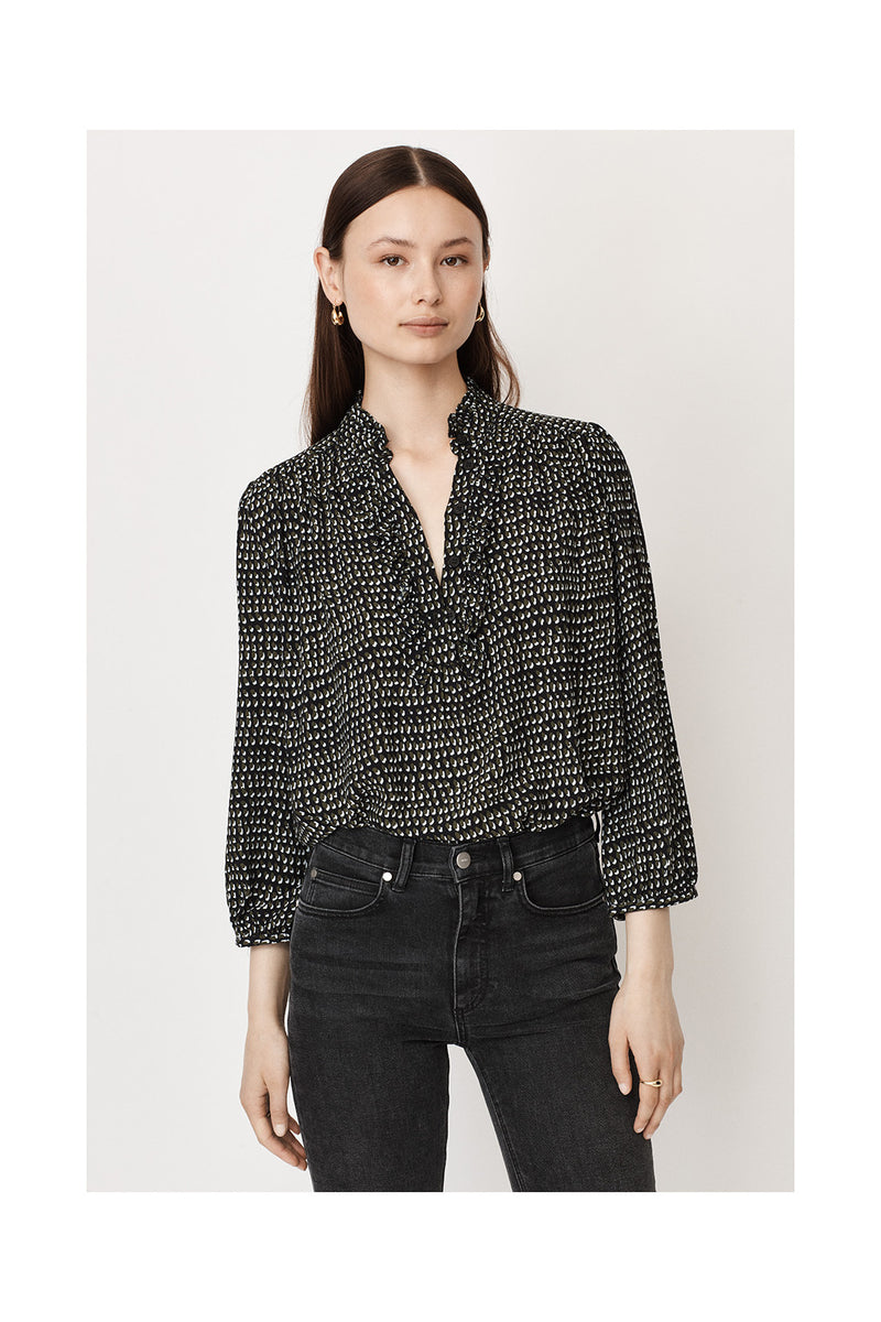 Ruffle collar three quarter length sleeves half placket with double ruffle blouse with black background and small khaki and white spot print