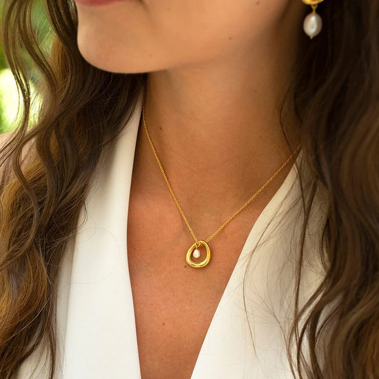 Gold plated sterling silver necklace with a fresh water pearl drop